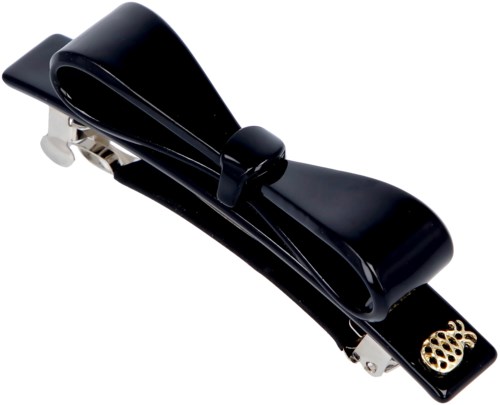 A black hair clip with a small gold pineapple charm attached.