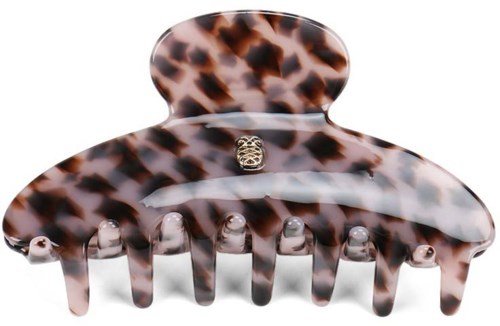 A large hair clip with a tortoise shell pattern and a small decorative element on the top.