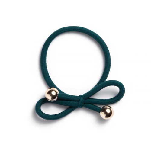 A teal hair tie with two gold-colored metal beads and a small bow shape.
