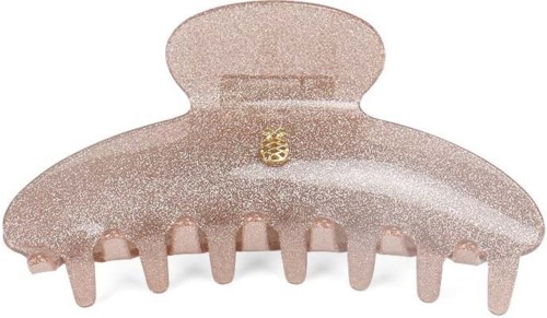 A large pink glittery hair claw clip with gold accents and a decorative top.