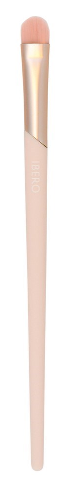 A makeup brush with a pink handle and a soft brush head. Gold accents are near the top.