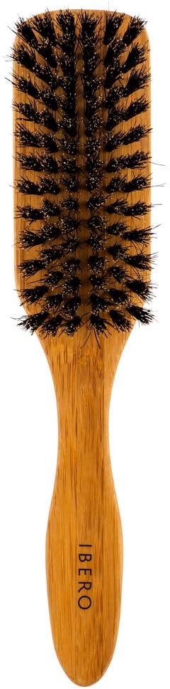 A wooden hairbrush with black bristles, labeled 'IBERRO' on the handle, on a black background.
