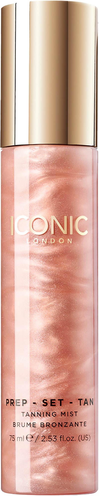 A tall, pink spray bottle with a gold cap, labeled 'Iconic London Prep Set Tan Tanning Mist.'