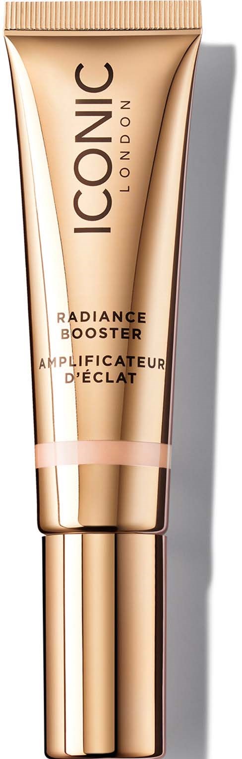 A gold-colored tube of Iconic London Radiance Booster cream with black and pink text and a metallic cap.