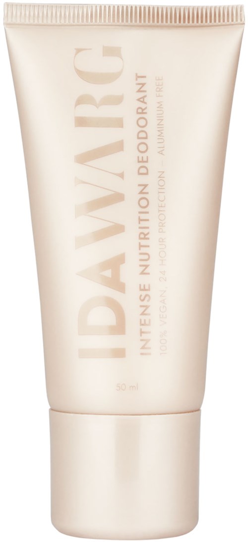 Een lichtgekleurde deodorant tube met beige tekst, staand verticaal. Het zegt "IDAVARC" en noemt voeding en bescherming.