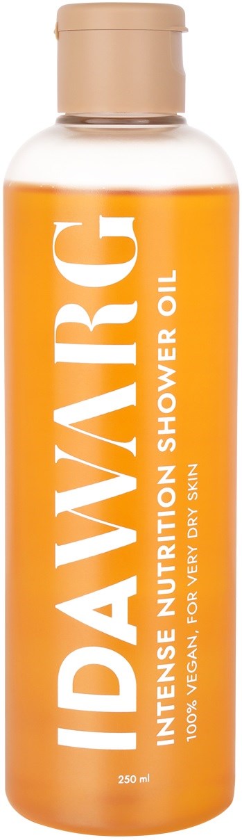 Een lange oranje fles met 'Nutritional Shower Oil' label en beige dop, bedoeld voor dehydreerde huid.