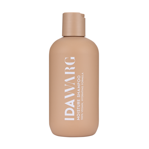 Beige Flasche mit 'IDAVARIC MOISTURE SHAMPOO' für Haare, mit einfachem Deckel.