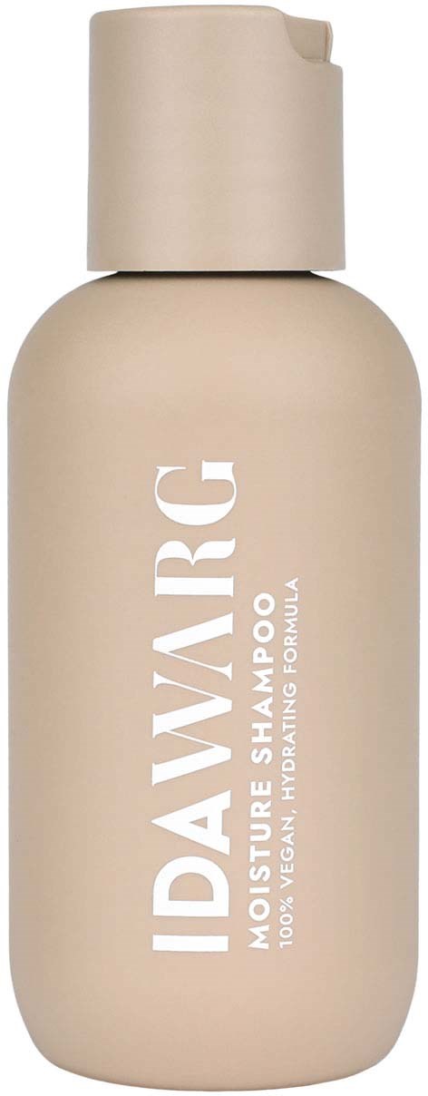 Een beige fles vochtinbrengende shampoo met eenvoudige dop, gemarkeerd met merk en doel in witte tekst.