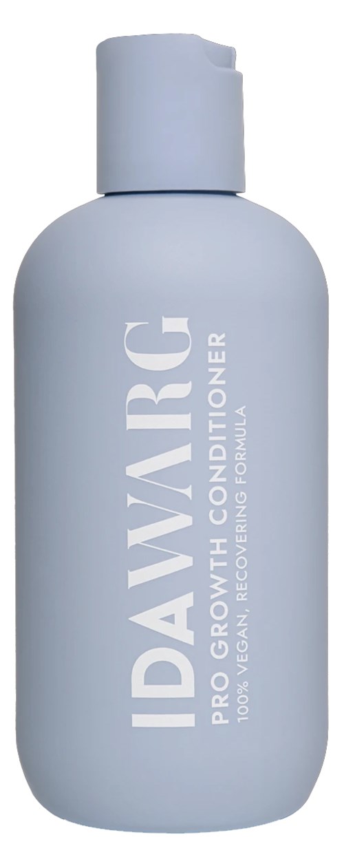 Vaaleansininen pullo IDAVRCG Pro Growth Conditioner ja valkoinen korkki, teksti edessä.