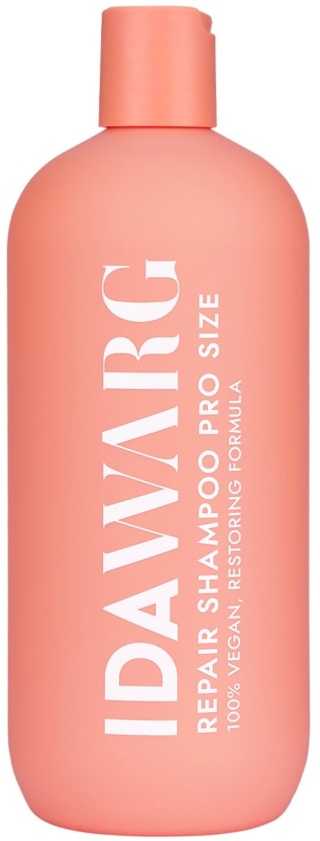 Pink bottle labeled for hair repair, vegan, restores and supports hair, with a simple design.