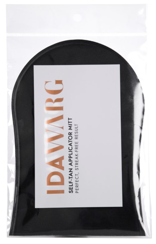 Black shoe insert with a white label saying 'DAVANG', 'Self-Tan Applicator Mitt', and other text.