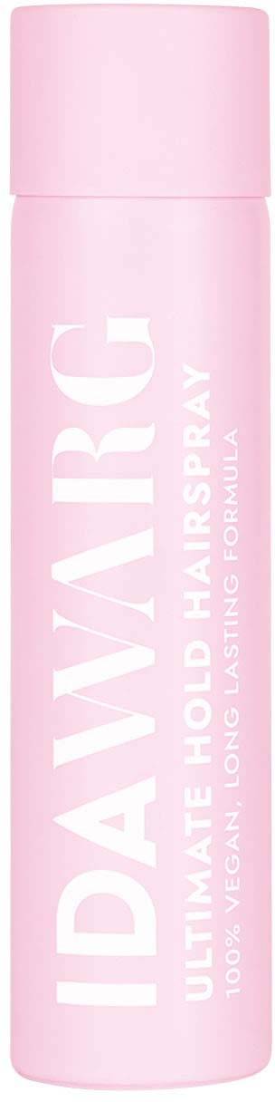Pink bottle labeled "IDARE HAIR G" with text about vegan long-lasting hair spray.