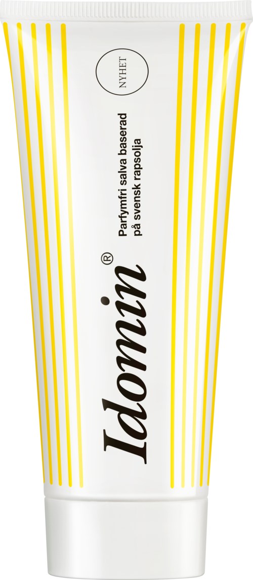 A tube of Idomin cream with white and yellow stripes, labeled for treating wounds with herbal safety.