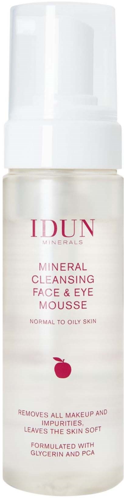 A white bottle of Idun Minerals mineral cleansing face and eye mousse with a label and pump top.