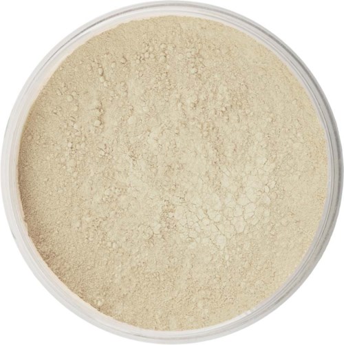 A container filled with light-colored powder, possibly beige or off-white, with a slightly uneven surface.