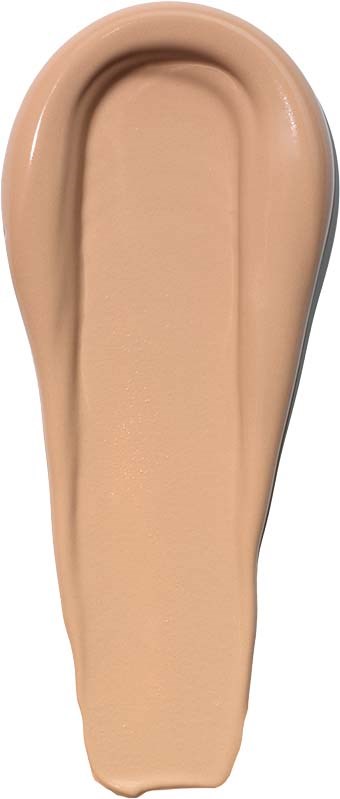 A beige liquid foundation in a spoon-shaped container with a rounded opening. It appears smooth and creamy.