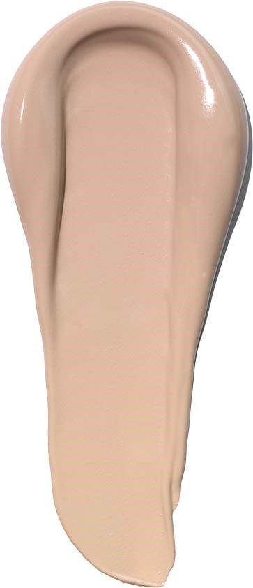 A beige liquid foundation swatch on a vertical surface with a smooth, creamy texture.