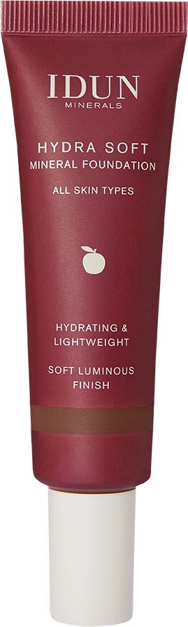A pink tube with white bottom labeled IDUN Minerals Hydra Soft Mineral Foundation for all skin types. Liquid foundation for hydration and light finish.