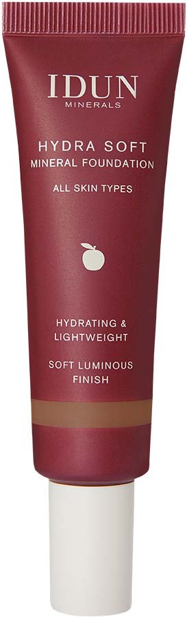 A pink tube of foundation with white and gold text, labeled IDUN Minerals Hydra Soft Mineral Foundation, suitable for all skin types.