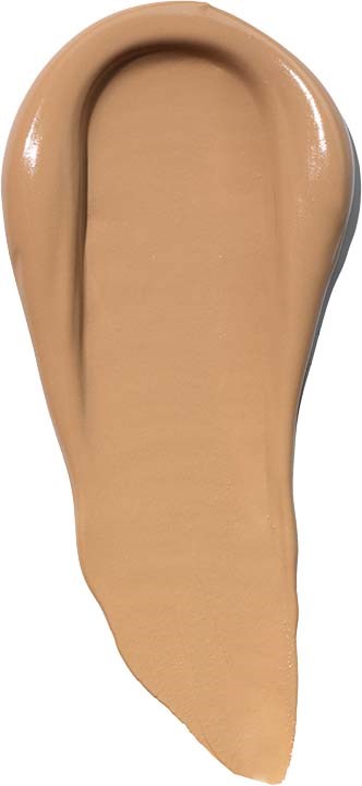 A beige liquid foundation is spread in a teardrop shape with a hollow side.