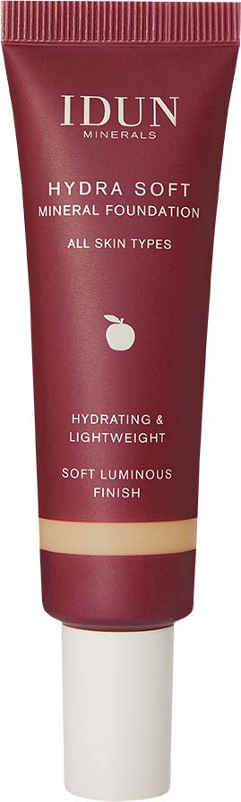 A tube of IDUN Minerals Hydra Soft Mineral Foundation for all skin types, described as hydrating, lightweight, and with a soft luminous finish.