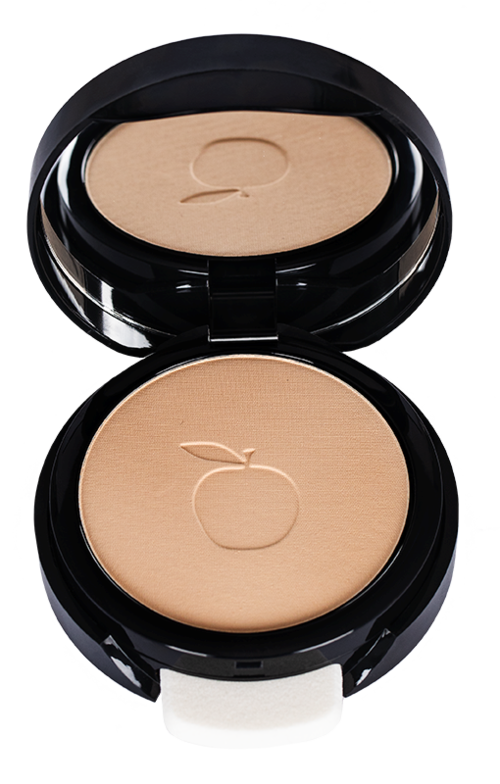 En kompakt pressed powder med et logo av et eple på, i en svart og klar plastboks med speil.