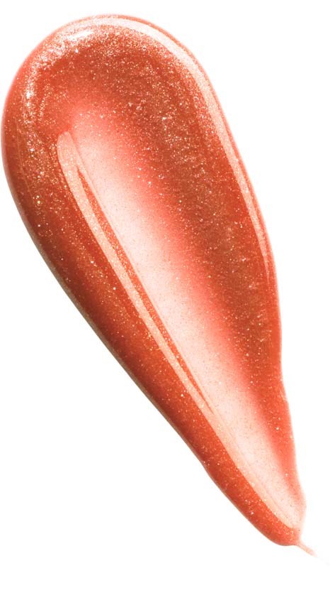 A teardrop-shaped swatch of shimmering, reddish-orange lip gloss with tiny sparkles.