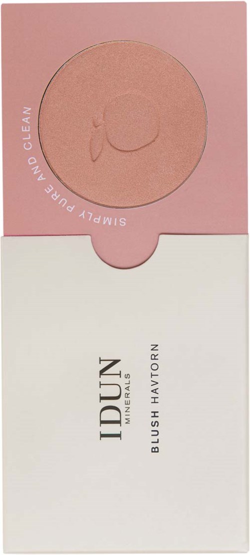 A makeup product in pink and white packaging with the names IDUN and Blush Havtorn. It promotes a clean, slim skin look.