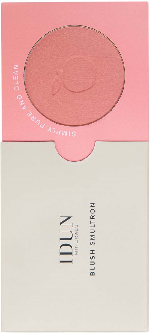 Pink blush product in a box with a circular window showing the product inside. The box has soft colors and simple design.
