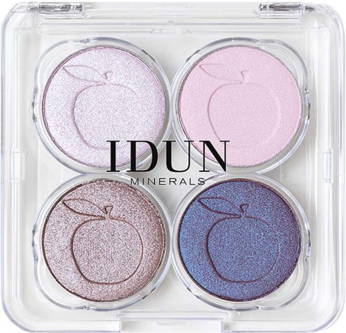 Four round eyeshadow pans in a clear case, with pastel pink, purple, brown, and blue shades, and a logo on the front.