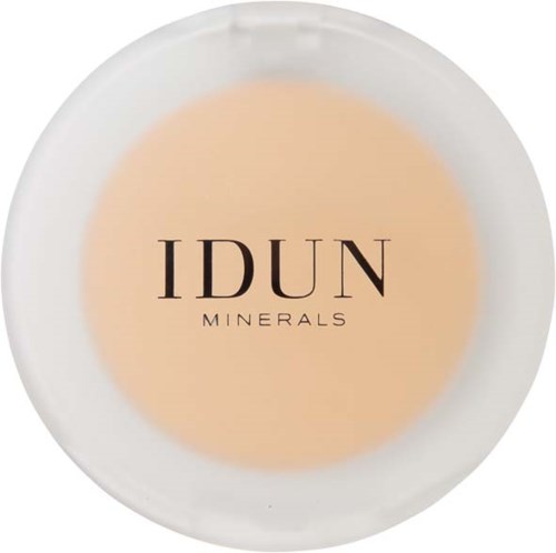 Ein weißer Teller mit beige Pulver und schwarzem Text: 'IDUN MINERALS'.
