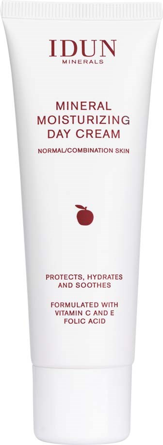 A white tube of skin moisturizer with a red apple logo, labeled for normal and combo skin, containing vitamins C, E, and folic acid.