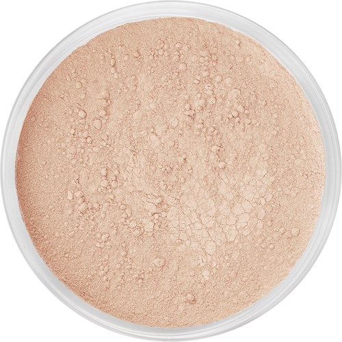 Ein runder, beiger Puder mit kleinen Klümpchen, wahrscheinlich für Make-up oder Hautpflege.