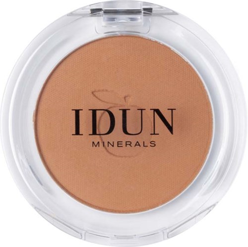 A compact container of IDUN Minerals pressed powder with beige color and black text on top.
