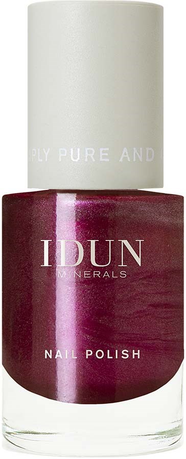 En flaska nagellack i vinrött från IDUN Minerals med beiget lock.