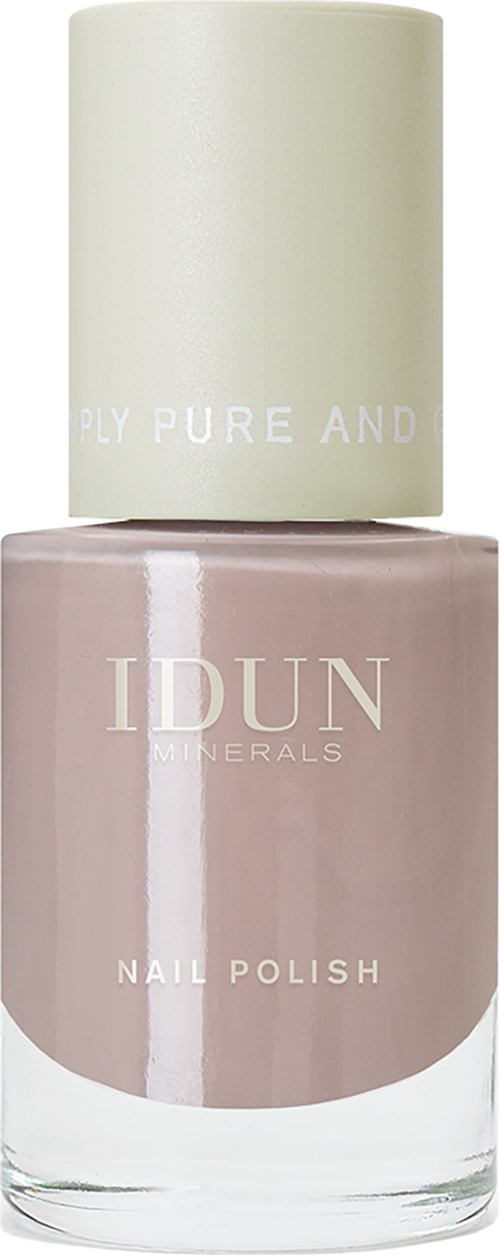En nagellackflaska med ljusrosa färg och vit topp. Märket är IDUN Minerals.