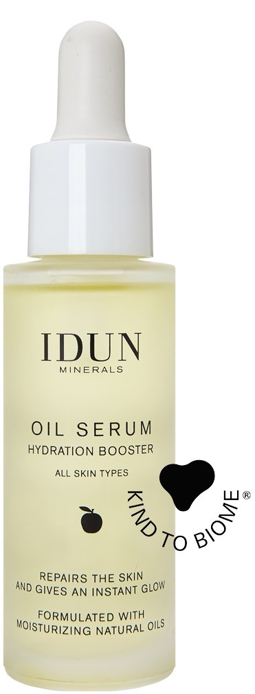 A small bottle of IDUN Minerals Oil Serum, with a dropper cap, labeled for skin hydration and repair.