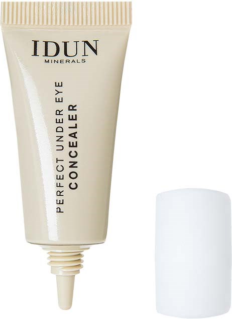A tube of concealer with a cap lying next to it, labeled 'IDUN MINERALS Perfect Under Eye Concealer.'