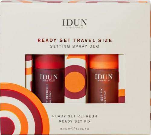 Box contains two spray bottles labeled 'IDUN Minerals' for travel use, in red and orange colors.