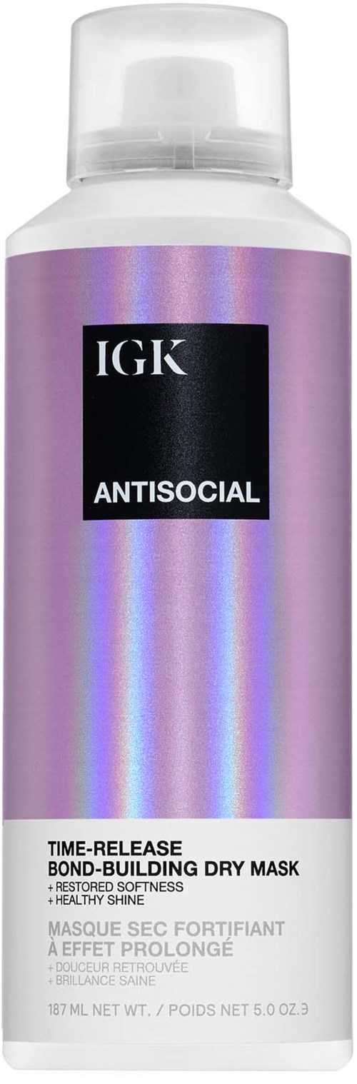 Eine Flasche IGK Antisocial Trockenkur für Haare mit lila und schwarzem Etikett, 187 ml.