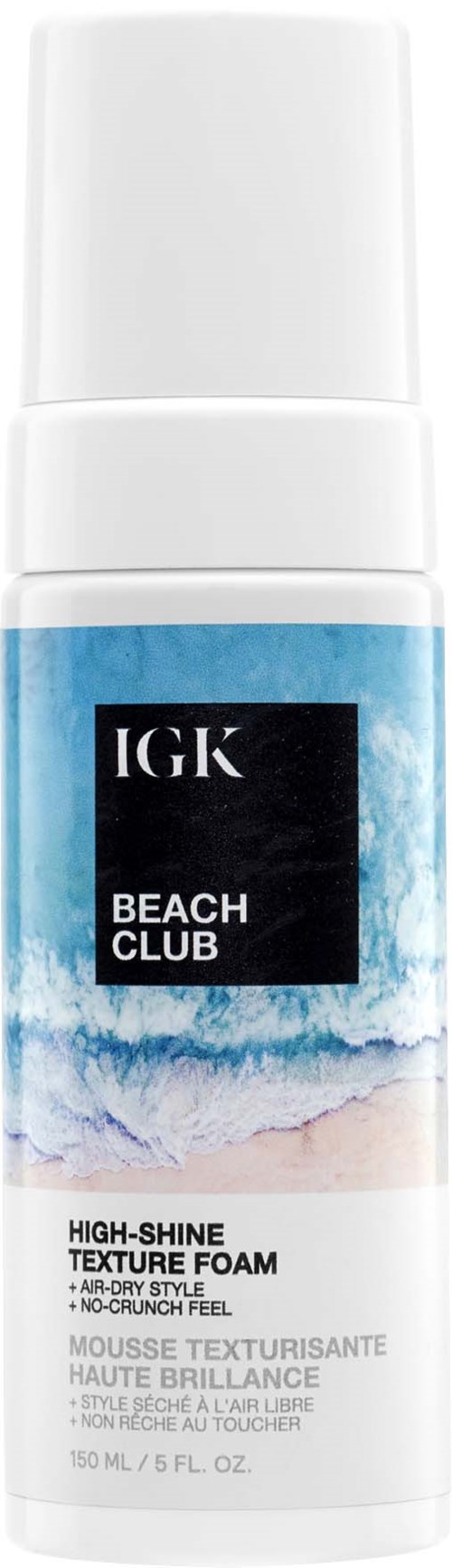 Een witte spuitbus met een label van een blauwe oceaan, met de woorden 'IGK BEACH CLUB' en 'TEXTURE FOAM'.