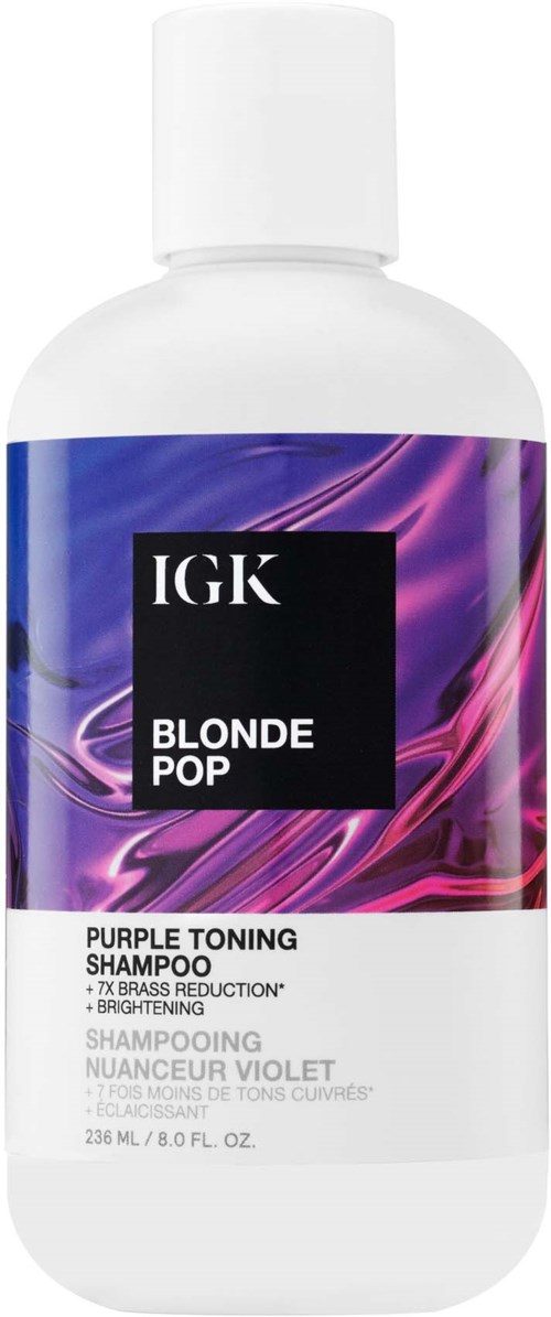 Eine weiße Flasche mit einem lila und pink schimmernden Etikett, enthält IGK Blonde Pop lila Toning Shampoo.