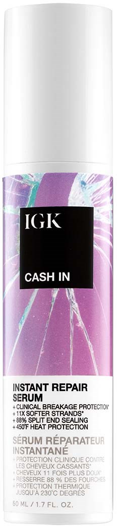 Een witte pompflacon met een paarse en zwarte etiket die zegt IGK Cash In, Instant Repair Serum.
