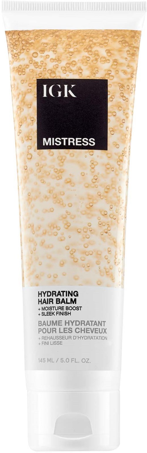 Een tube IJK Mistress hydraterende haarbalsem met een zwart label, beige en witte ontwerp, 5 oz.