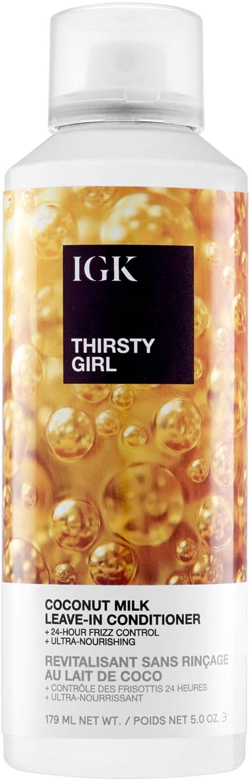 En flaska IGK Thirsty Girl kokosmjölk leave-in conditioner med en färgglad etikett och vit kork.