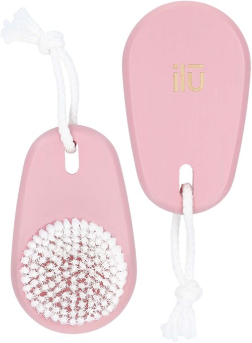 Pink massage brush with a white string and soft bristles, designed for facial or body cleansing.