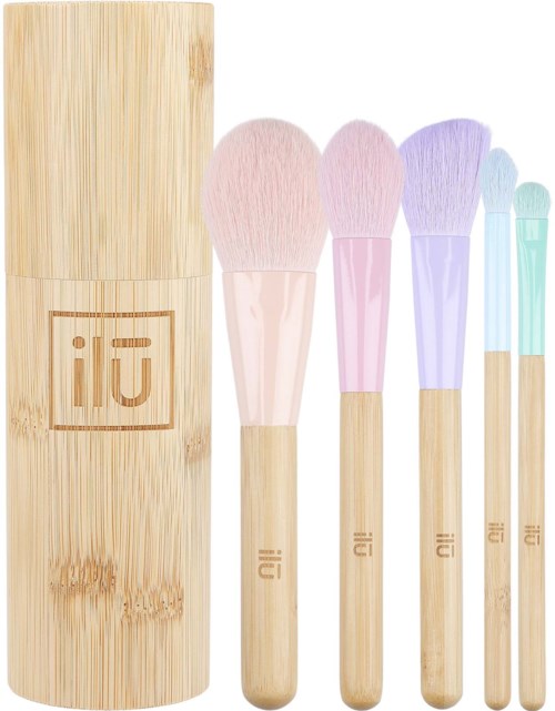 A set of six makeup brushes with wooden handles, pastel-colored synthetic bristles, and a bamboo case.