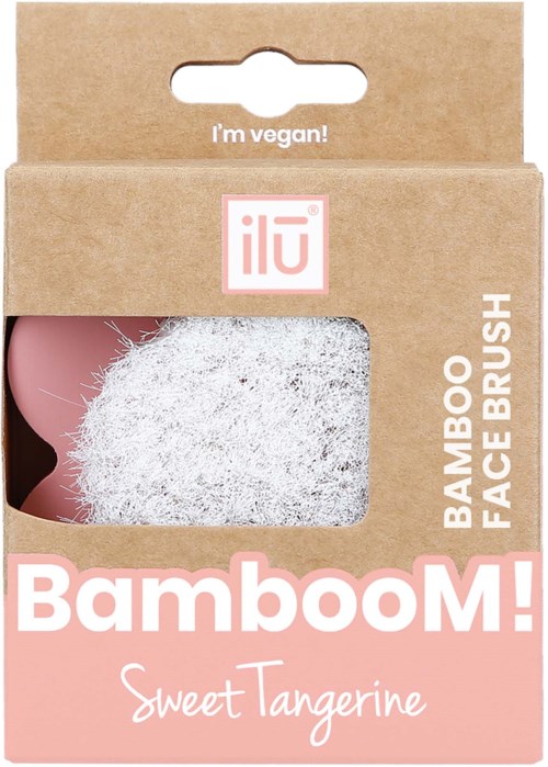 A biodegradable facial scrub brush labeled as vegan, in pink and white packaging with the product name and scent.