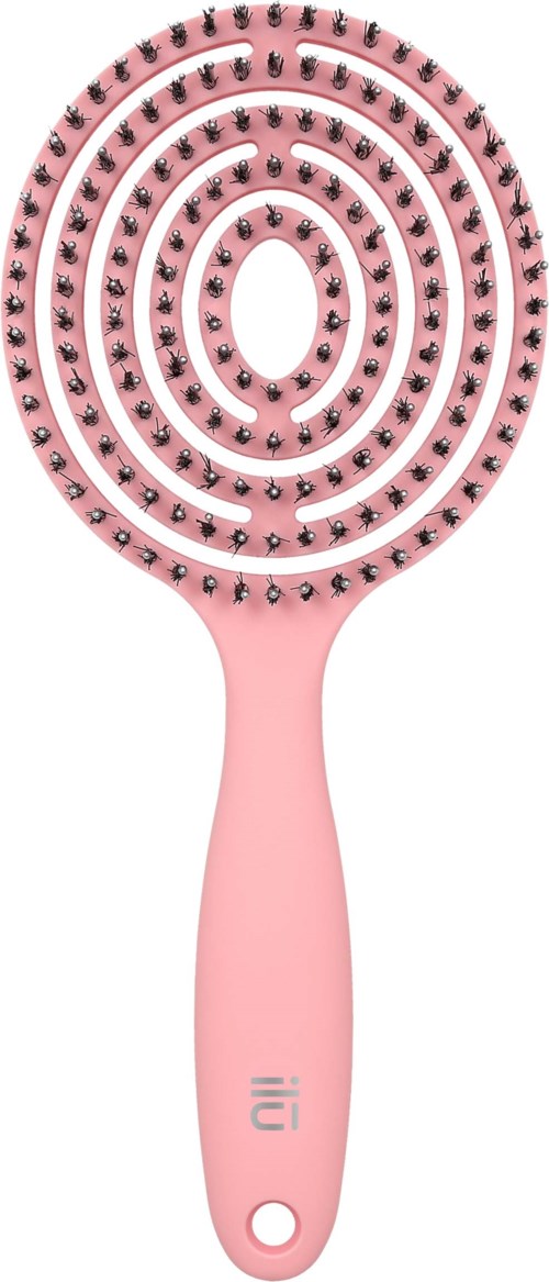 A pink hairbrush with black bristles arranged in concentric circles.