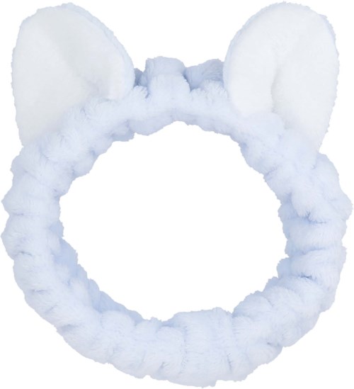 A fluffy white headband with bear ears, made of soft material, used as a pillow or costume accessory.